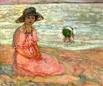 Bild:A girl in a pink robe by the sea