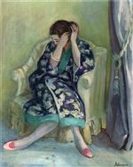 Bild:Woman Adjusting Her Hair seated on an Armchair