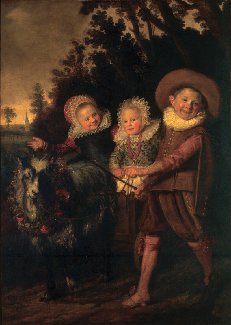 Drei Kinder mit Ziegenbock und Wagen