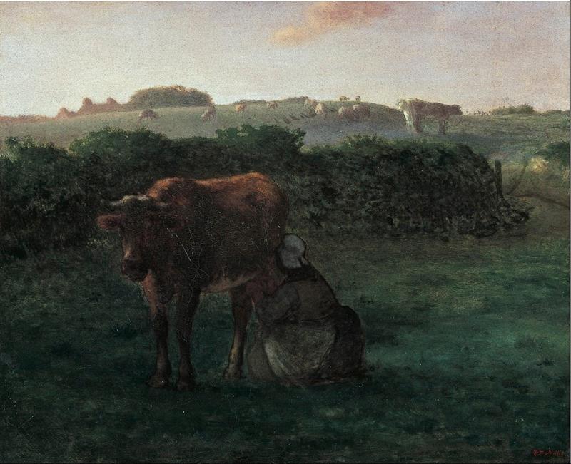 Frau beim Melken einer Kuh