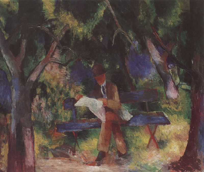 Lesender Mann im Park